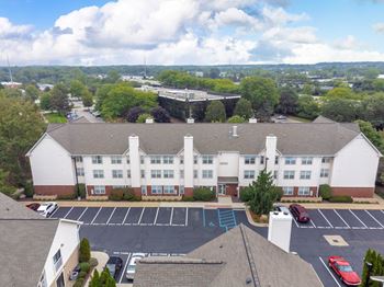 Building with a parking lot in front